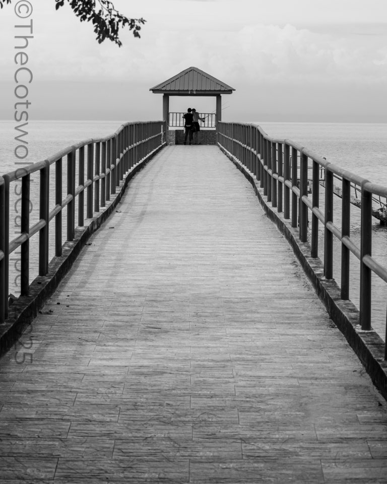 Young couple fishing, Penang, Malaysia